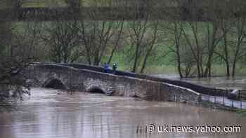 Flood warnings in place across England bring misery for Christmas travellers
