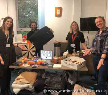 Hundreds of coats donated for Village Gym charity pledge