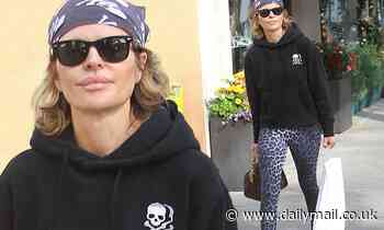 Lisa Rinna shows off her tough side in skull and crossbones bandanna
