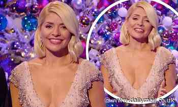 Holly Willoughby sends fans wild as she bares her cleavage in VERY low cut dress