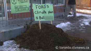 Climate protesters dump cow manure outside Doug Ford’s Etobicoke office