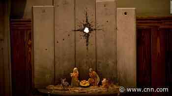 Banksy unveils 'modified nativity' scene in Bethlehem