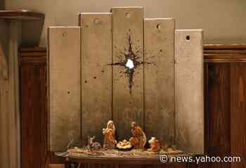 Mysterious artist Banksy unveils dark nativity in Bethlehem