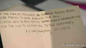 China denies forced labour accusations after plea found in Christmas card