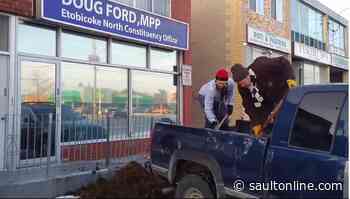 Protesters dump manure in front of Premier Doug Ford’s constituency office