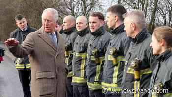 Charles visits village hit by devastating floods