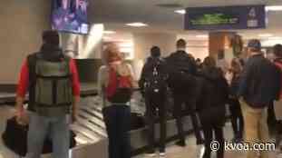 Travelers on way home for holidays