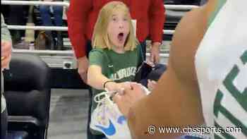 Giannis Antetokounmpo gets in holiday spirit by surprising young Bucks fan with his sneakers