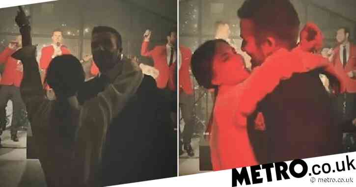 David and Victoria Beckham pack on the PDA after Cruz and Harper’s baptism
