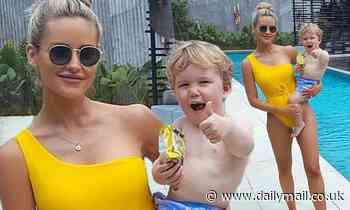 WAG Jessie Murphy is hilariously upstaged by her one-year-old son Max's very cheeky pose 