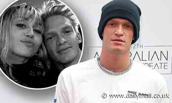 Cody Simpson 'kisses woman on the lips' while 'texting Miley Cyrus' at NYC lounge
