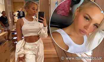 Tammy Hembrow raises eyebrows as she goes braless in a tiny crop-top inside Louis Vuitton store