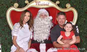 Cricket legend Michael Clarke and wife Kyly take daughter Kelsey-Lee, four, to meet Santa