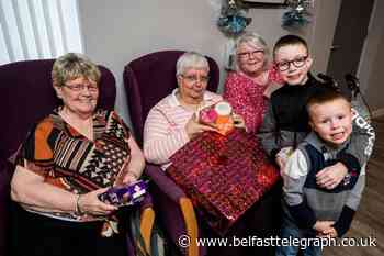Big-hearted Lewis (8) saves pocket money to buy presents for pensioners