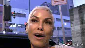 Nicole Murphy Throws Shade at Bill Cosby Over Eddie Murphy Attack