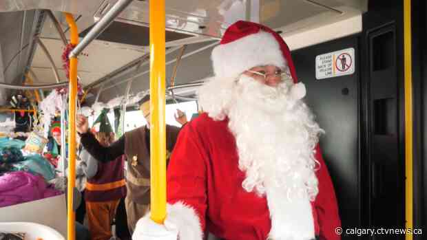 Santa rides the bus to help Magic of Christmas deliver gifts to Calgary families in need