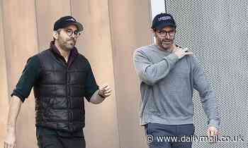Ryan Reynolds and Hugh Jackman sport glasses and stubble on Christmas Eve stroll together in NYC