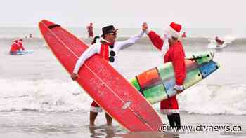 Surfing Santas ride waves along Florida's Space Coast