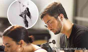 Demi Lovato gets 8 HOUR tattoo of an angel with doves to represent 'rebirth of the spirit'