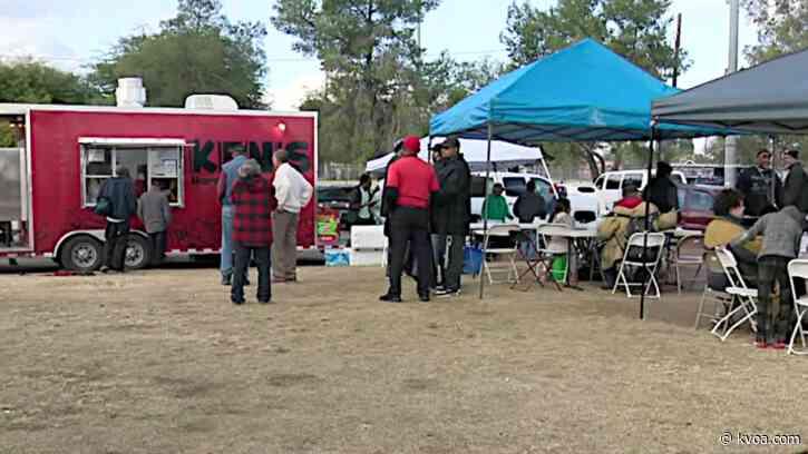 Members of community provide a Christmas barbecue for homeless