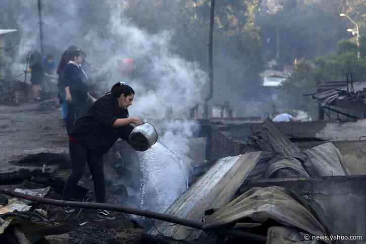 Helicopters in Chile douse fire that destroyed 200 homes
