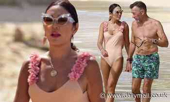 Duncan Bannatyne, 70, and wife Nigora, 39, enjoy a beach day during festive getaway in Barbados