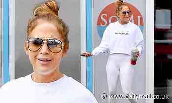 Jennifer Lopez is a delight in white as the 50-year-old flaunts her age-defying curves in leggings
