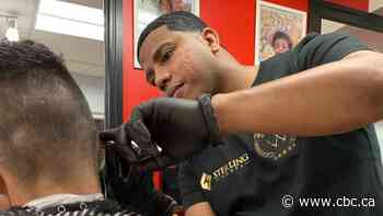 Edmonton barber hosts free haircuts to give back to less fortunate