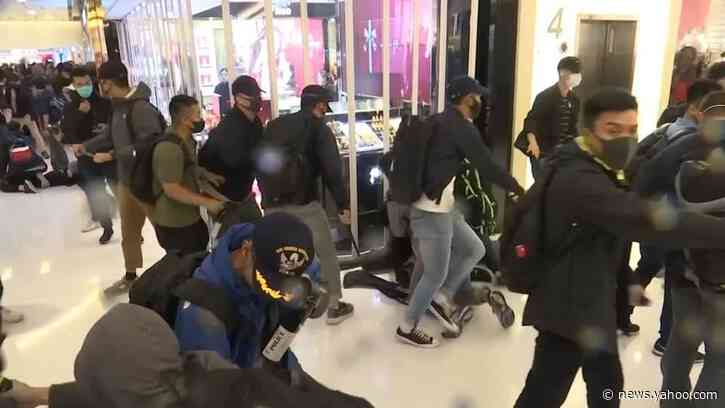 Hong Kong police use tear gas, pepper spray to disperse protesters on Christmas Day