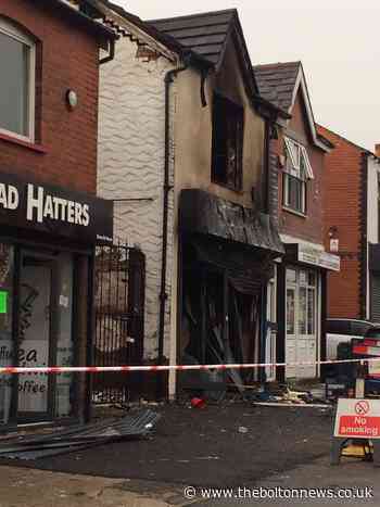 Roads closed as crews tackle building fire in Farnworth