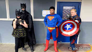 Friends become superheroes to donate thousands of teddy bears to children