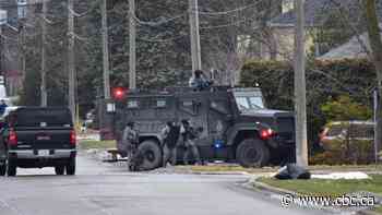 Police surround suspect barricaded in Richmond Hill home after shots fired at officer
