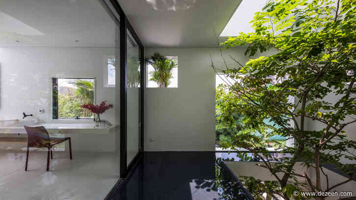 MIA Design Studio covers Vietnamese home with protruding planters