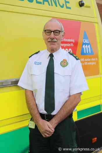Trevor Baldwin receives the Queen’s Ambulance Medal for Distinguished Service