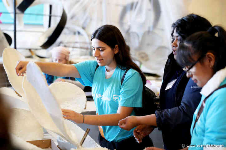 Photos: Blind students put the finishing touches on Rose Parade float