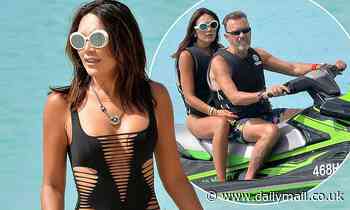 Duncan Bannatyne's wife Nigora, 39, puts on an eye-popping display in a black swimsuit in Barbados