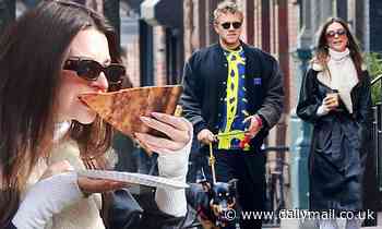 Emily Ratajkowski eats pizza with husband and dog in NYC... after 'accepting payout to vacate loft'