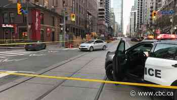 Woman, 30s, in serious condition after being 'pinned' to building following 2-vehicle crash