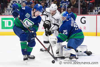 Markstrom makes 49 saves as Canucks edge Kings 3-2