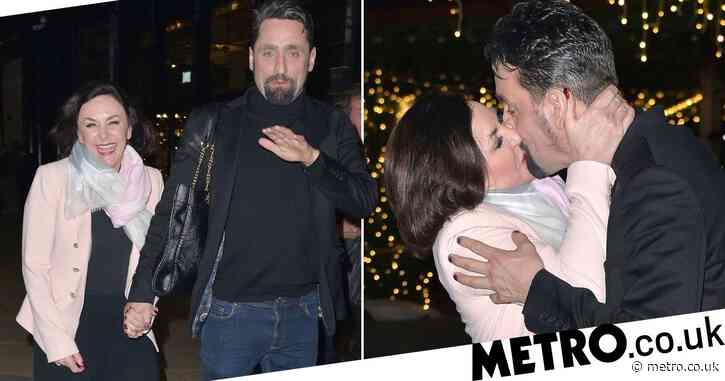 Shirley Ballas and boyfriend Danny Taylor can’t take their hands off one another as they pack on the PDA