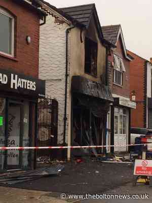 Drones inspect fire-hit building in Plodder Lane, Farnworth