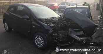 Car 'completely written-off' following crash between car and parked vehicle in the Rhondda