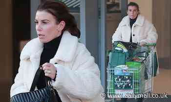 Coleen Rooney wears Chanel and Gucci for Waitrose shop