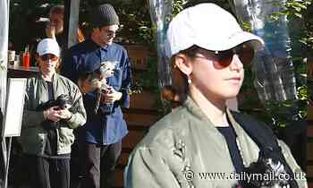 Ashley Tisdale and her husband Christopher French step out for a walk with their pups