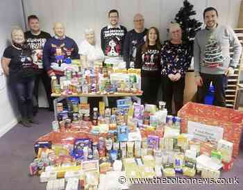 Diamond Bus employees collect supplies for local foodbank