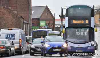 Should non-essential traffic be banned within the city walls?