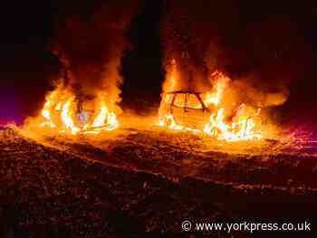 Fire destroys Kia and Nissan cars in suspected arson attack