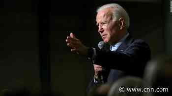 Hecklers interrupt Biden on campaign