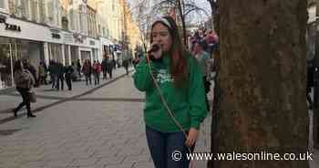 Teenage busker raises thousands for cancer charity during Christmas