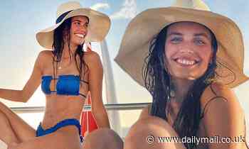 Sara Sampaio beams in a blue bikini and urges followers to make the 'last day of the decade' count 